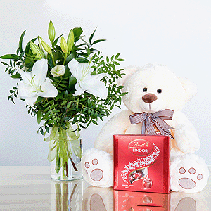 Gift set "Lilies, teddy bear and sweets" with delivery Novosibirsk