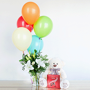 Gift set "Lilies, teddy bear, balloons and sweets" with delivery Novosibirsk