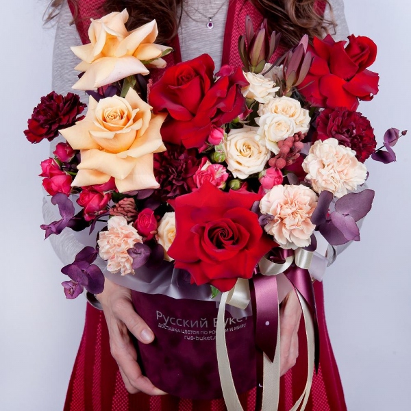 Rose Red 50 cm Ecuador - 4, Cream Rose 50 cm Ecuador (Creme Caramel) - 3, Spray rose: white, cream, light pink 50 cm - 2, Carnation white, cream - 4, Spray rose: red 50 cm - 2, Carnation red - 4, Round flower box small , Oasis, Eucalyptus Cinerea, Leukodendron, Brunia Green Lanuginosa (1 pc.), Wrapping Paper