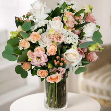 White rose 50 cm - 5, Spray rose 50 cm (multiple small blooms on a stem) - 3, Santini White Spray Chrysanthemum - 3, lisianthus - 3, Hypericum, Wrapping Paper, Ribbon, Eucalyptus populus (1 pc.)