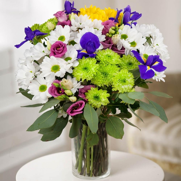 Irises - 9, Pink Lisianthus (Eustoma) - 5, Bacardi White Spray Chrysanthemum - 3, Athos pom Feeling Green - 3, Bacardi Yellow Spray Chrysanthemum - 3, Eucalyptus populus (1 pc.), Wrapping Paper, Ribbon