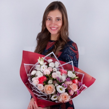 Athos poms Stallion - 3, Spray rose 50 cm (multiple small blooms on a stem) - 3, Rose Cream 50 cm - 3, Carnations - 3, lisianthus - 1, Blue Statice, Pistachio, Wrapping Paper, Ribbon