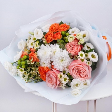 Baltica White Spray Chrysanthemum - 1, Santini White Spray Chrysanthemum - 4, Spray rose 50 cm (multiple small blooms on a stem) - 3, Peony rose Kahala 50 cm - 3, lisianthus - 2, Hypericum, Pistachio, Wrapping Paper, Ribbon