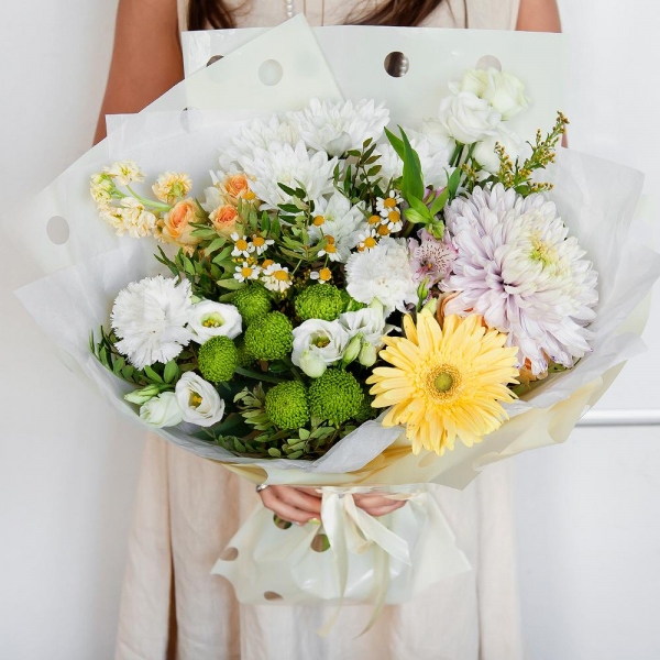 Chamomile - 1, Baltica White Spray Chrysanthemum - 2, Athos pom Feeling Green - 2, Alstromeria white, soft pink - 3, lisianthus - 2, Spray rose: white, cream, light pink 50 cm - 2, White Matthiola - 2, Carnation white, cream - 4, Magnum Purple Chrysanthemum - 1, Gerbera yellow - 1, Solidago (1 pc.), Pistachio, Wrapping Paper