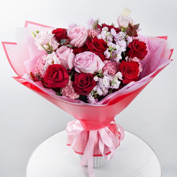 Peony rose pink 'OHara' - 5, Red rose 50 cm - 12, Pink Matthiola - 5, Pink carnation - 9, Pink Lisianthus (Eustoma) - 2, Eucalyptus, Wrapping Paper