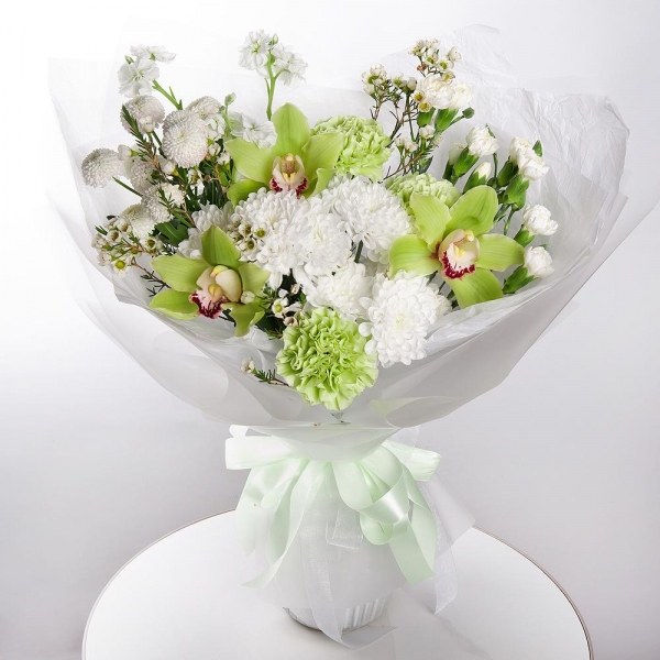 Green Cymbidium Orchid Bud - 3, Baltica White Spray Chrysanthemum - 1, Green carnation - 5, White spray carnation - 3, White Matthiola - 2, Athos poms Stallion - 1, Flask for orchids, Waxflower (1 pc.), Wrapping Paper