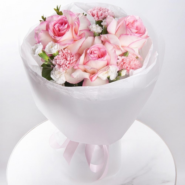 Rose Esperance - 4, Pink carnation - 4, White spray carnation - 5, Wrapping Paper