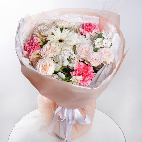 Baltica White Spray Chrysanthemum - 1, Peony sprayrose - 3, Pink carnation - 5, Alstromeria white, soft pink - 5, White Matthiola - 2, Gerbera white - 1, Dried flowers in assortment, Pistachio, Wrapping Paper