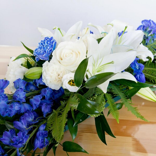 Blue carnation - 3, White rose 50 cm - 3, lisianthus - 3, Lilies - 1, Carnation white, cream - 4, Pot for compositions, Oasis, Blue Delphinium, Ambrella, Ruscus italian, Aspidistra (1 pc.), Skimmia