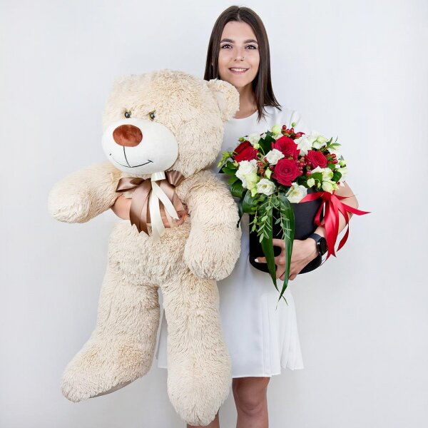 Red rose 50 cm - 9, lisianthus - 5, Round flower box medium, Oasis, Film, Ruscus, Aspidistra (1 pc.), Hypericum, Eucalyptus parvifolia (1 pc.), Teddy bear 70 cm, Ribbon