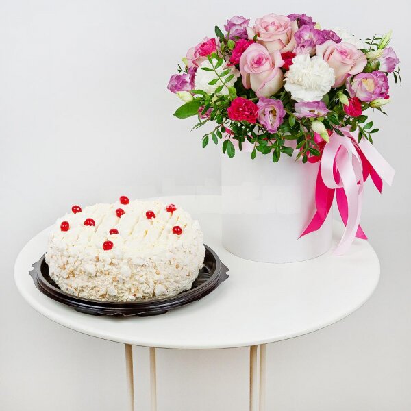 Carnation white, cream - 3, Pink Lisianthus (Eustoma) - 5, Pink spray carnation - 3, Pink rose 50 cm - 3, Round flower box small , Oasis, Film, Pistachio, Ribbon, Cake in assortment